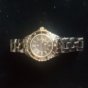 Black and Gold Issac Mizrahi Wrist Watch. Measurements included in photos.